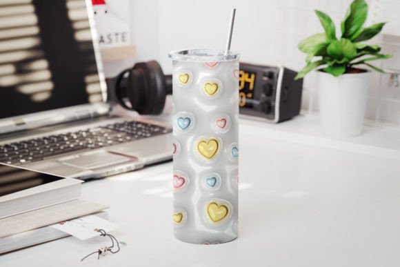 3D Inflated Tumbler with pink, yellow and blue hearts on a white background